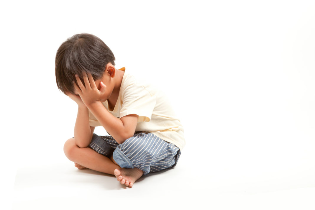 Angry sad child boy punishment ,solated on white background
