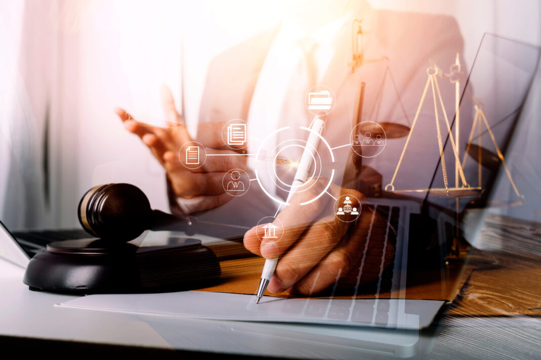 Male lawyer working with contract papers and wooden gavel on tabel in courtroom. justice and law ,attorney, court judge, concept.