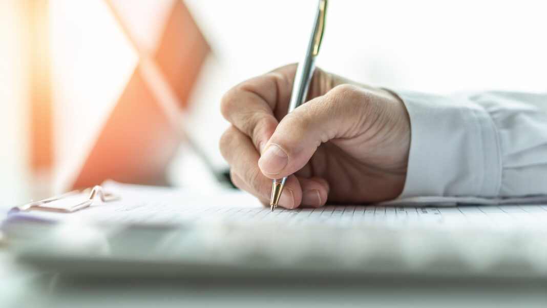 Business application registration with applicant filing company document form, filling in personal profile, registering or applying for job, employment opportunity, administrative office career