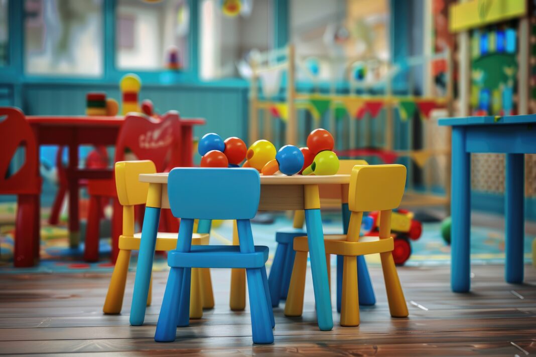 Chairs table and toys. Interior of kindergarten.
