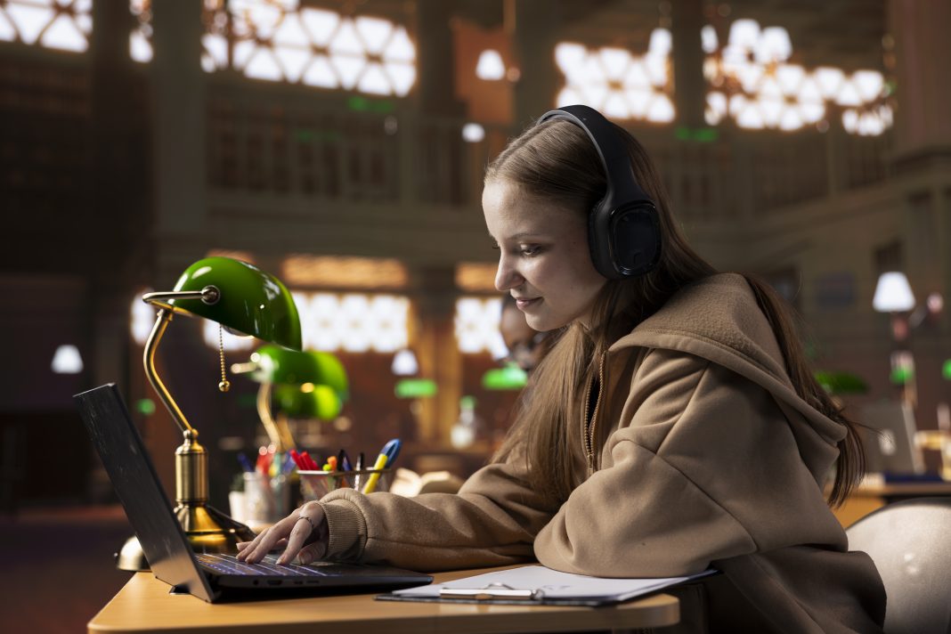 College student listening to study music to create the perfect ambient